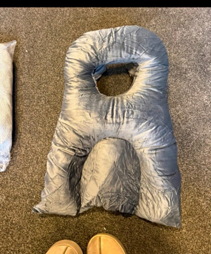 Grey face down sleeping pillow